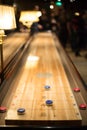Playing the game of shuffleboard Royalty Free Stock Photo