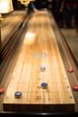 Playing the game of shuffleboard Royalty Free Stock Photo