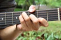Playing guitar chord F# Royalty Free Stock Photo