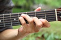 Playing guitar chord F# Royalty Free Stock Photo