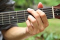 Playing guitar chord G Royalty Free Stock Photo
