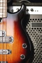 Playing guitar...Close up photo of a brown electric guitar with volume and tone control knobs and amplifier Royalty Free Stock Photo