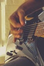 Playing the guitar. Guitarist`s hand dynamic motion. Royalty Free Stock Photo