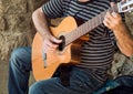 Playing guitar at the street Royalty Free Stock Photo