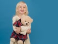 Playing with her toy friend. Small kid happy smiling. Little girl with teddy bear. Small girl hold toy bear. Little Royalty Free Stock Photo