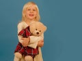 Playing with her toy friend. Small kid happy smiling. Little girl with teddy bear. Small girl hold toy bear. Little Royalty Free Stock Photo