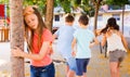 Playing hide and seek. Girl covering eyes her hands Royalty Free Stock Photo