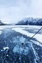 Playing Ice Hockey on Frozen Lake Minnewanka in Banff, Alberta, Canada