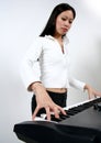 Playing keyboards Royalty Free Stock Photo