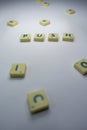 Playing letter cube games , words games.