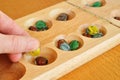 Playing Mancala Royalty Free Stock Photo