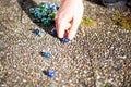 Playing marbles, old children`s game, colorful balls Royalty Free Stock Photo