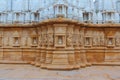 Artistic carving on red and white stone, shankheshwar parshwanath, jain temple, gujrat, India Royalty Free Stock Photo