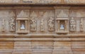 Artistic carving on red and white stone, shankheshwar parshwanath, jain temple, gujrat, India Royalty Free Stock Photo