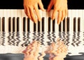 Playing piano reflection