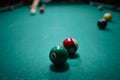 Playing pool in a night pub Royalty Free Stock Photo