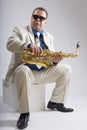 Saxophonist Caucasian soloist plays the saxophone Royalty Free Stock Photo