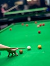 Playing snooker balls on the green game table Royalty Free Stock Photo