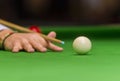 Playing snooker - man aiming the cue ball Royalty Free Stock Photo