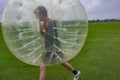 Playing soccer in a plastic bubble