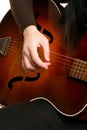 Playing strumming a guitar Royalty Free Stock Photo