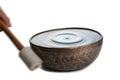 Playing Tibetian singing bowl on white Royalty Free Stock Photo