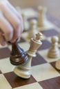 Playing Wooden Chess Pieces. Chess Game. The Fall Of The King. Vertical Photo