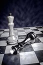 Playing wooden chess pieces game over Royalty Free Stock Photo