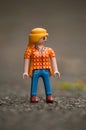 PLaymobil character standing on the road in outdoor