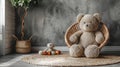 a playroom adorned with plush and wooden toys, set against gray walls and a wooden floor, within a photostudio featuring