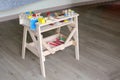 Playroom for children in a house with toys such as a kitchen, a table, a puppet theater, a ball pool, a piano and wood Royalty Free Stock Photo