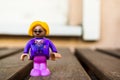 Playtive plastic toy figurine woman with glasses.