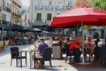 Plaza Chueca, Madrid, Spain - September 5, 2021: crowd of people enjoy summer terraces of many open bars downtown