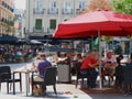 Plaza Chueca, Madrid, Spain - September 5, 2021: crowd of people enjoy summer terraces of many open bars downtown