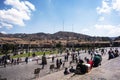 Plaza de Armas in Cuzco, gardens with flowers and old colonial buildings with restaurants and hotels Cielo Azul Cusco Peru