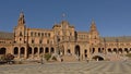 Main building and archways on Plaza de Espana on a sunny day in Sevilla, Spain. Royalty Free Stock Photo