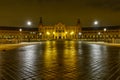 Plaza de EspaÃ±a in Seville, night scene after raining with long exposure photo and reflections of lights in water and cobbled Royalty Free Stock Photo