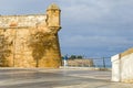 Plaza de Filipinas with a man fishing in the Bay of Cadiz, Spain