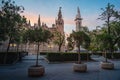 Plaza del Triunfo Square with Seville Cathedral and Monument to the Immaculate Conception at sunset - Seville, Spain
