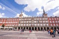 Plaza Major, the statue of Felipe III and its ancient buildings in the day with tourists