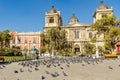 Plaza Murillo, La Paz central square full of pigeons with cathedral in the background, Bolivia