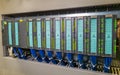 PLC modules in a row in electrical cabinet of automation control industrial system