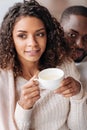 Pleasant African American couple drinking tea in the cafe Royalty Free Stock Photo