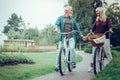 Pleasant aged couple holding their hands together Royalty Free Stock Photo