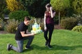 Boy gives  birthday gift to his girlfriend Royalty Free Stock Photo