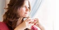 Young woman drinking coffee in the morning at restaurant Royalty Free Stock Photo