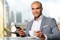 Pleasant businessman drinking coffee Royalty Free Stock Photo