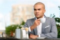 Pleasant businessman drinking coffee Royalty Free Stock Photo