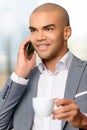 Pleasant businessman drinking coffee Royalty Free Stock Photo