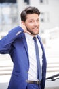 Pleasant businessman standing with bicycle Royalty Free Stock Photo